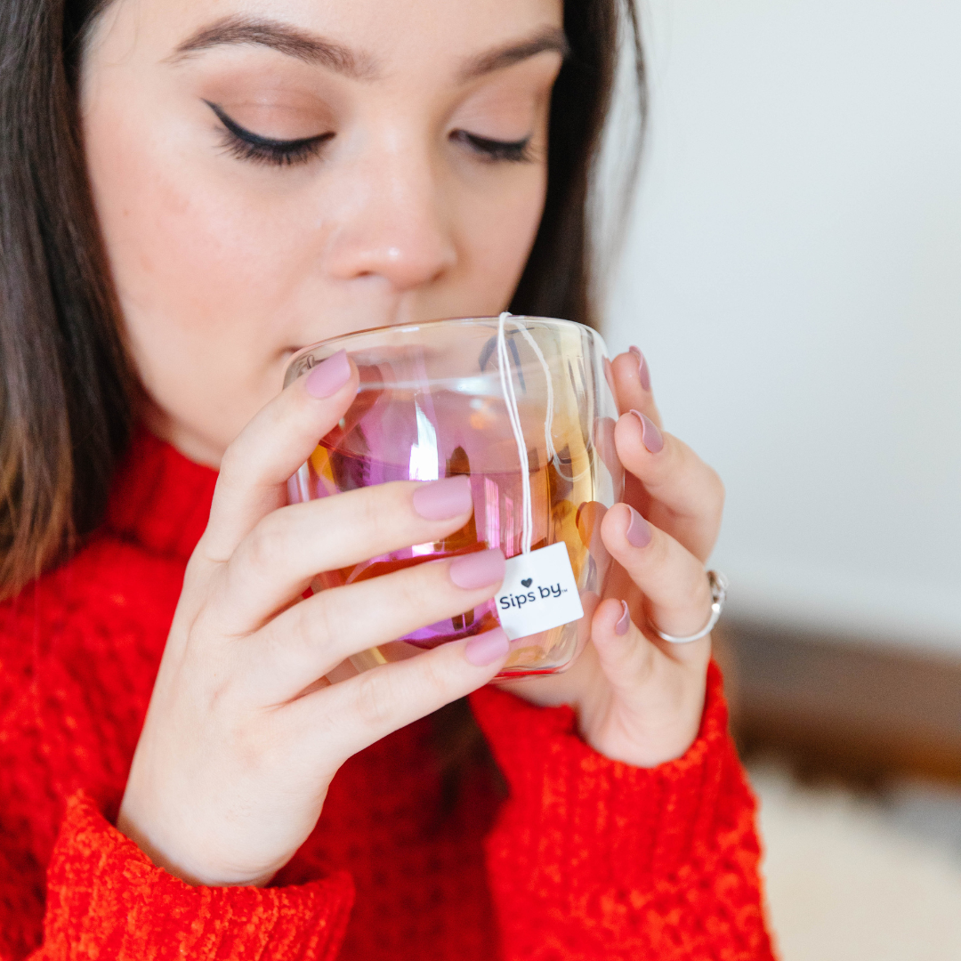 Cartoon mug of tea decorated with a heart