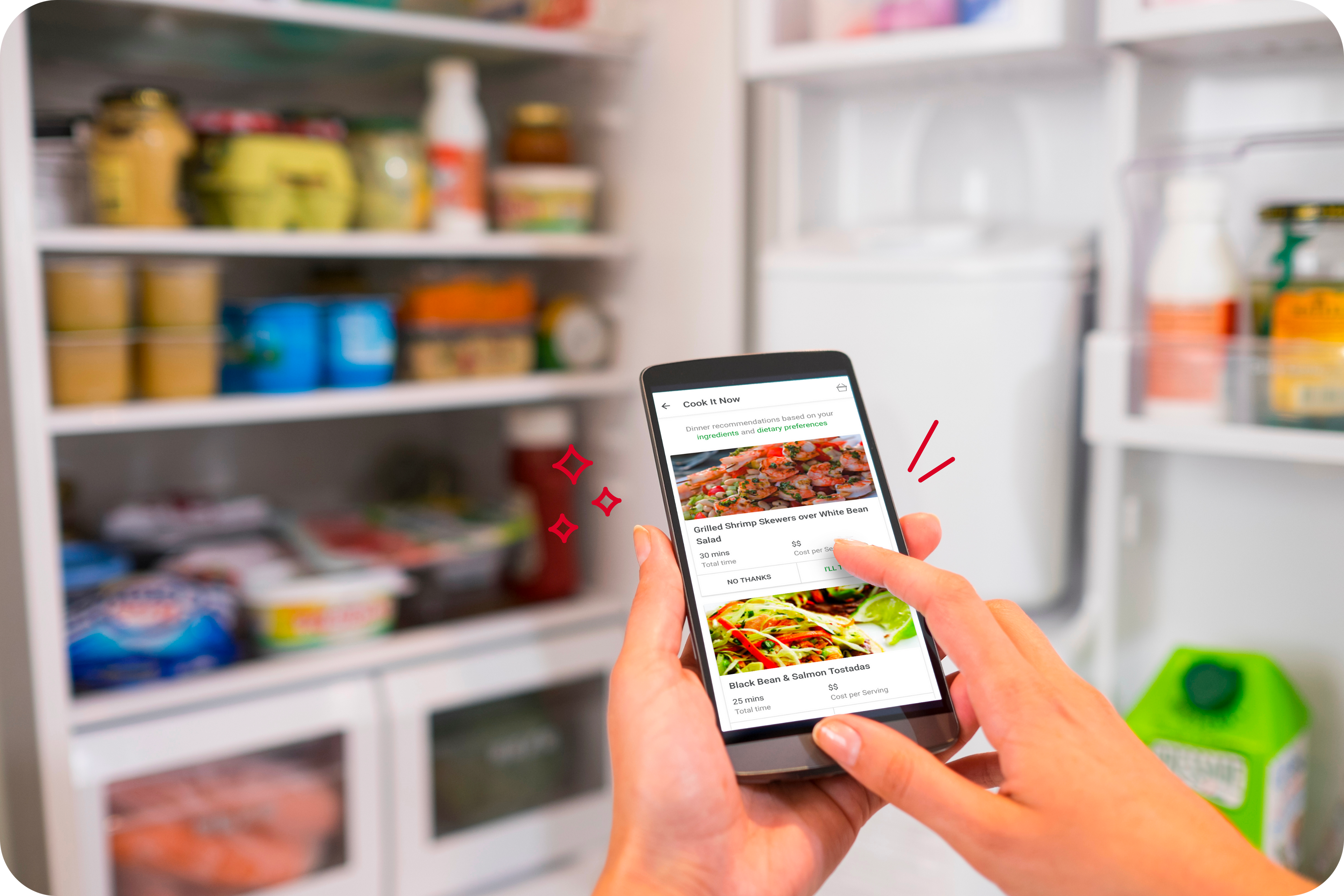 Photo showing a user scrolling delicious recipes on the Foodsmart mobile app with their fridge open