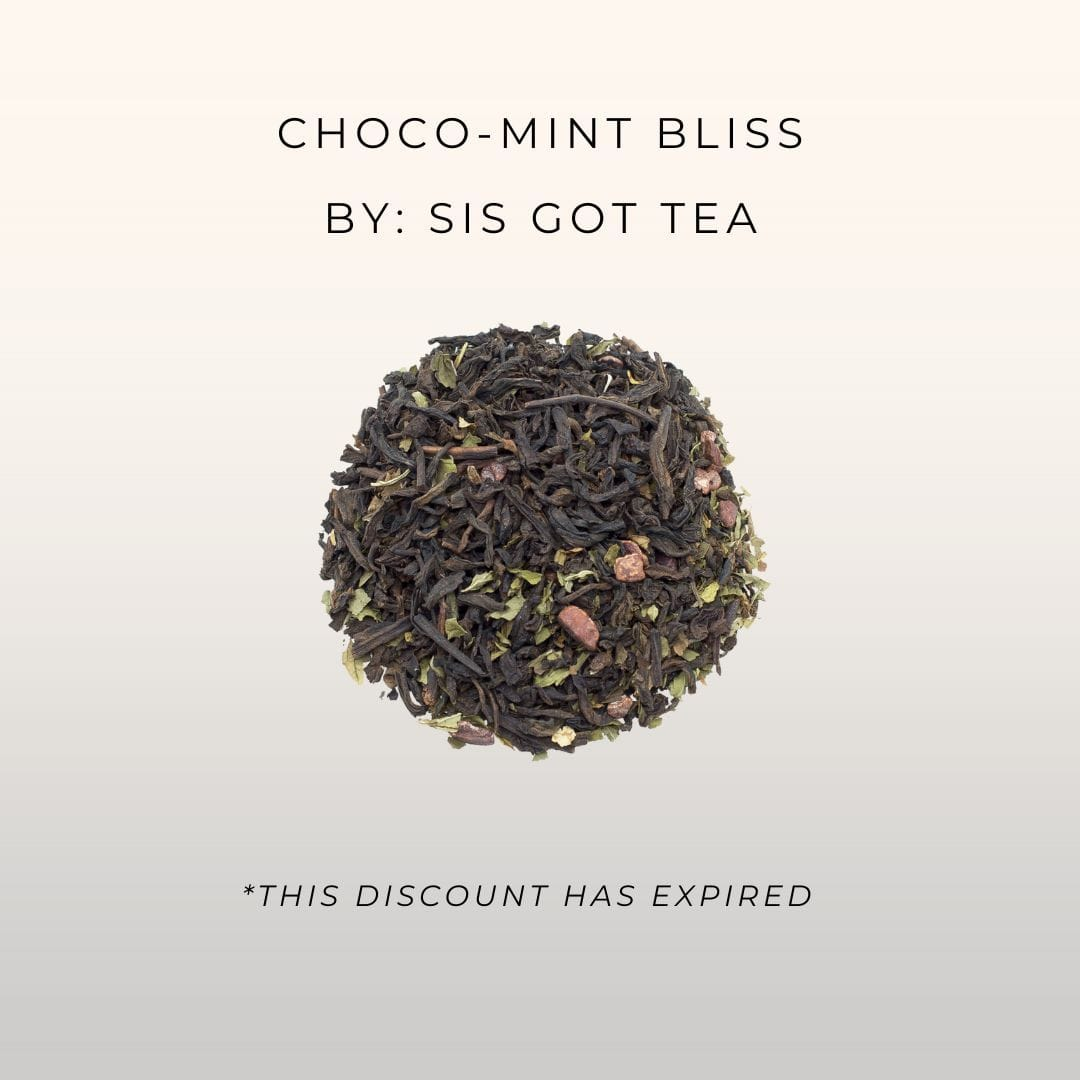 10 Sips by mini tea boxes with red bows in a tree with a star steeper at the top