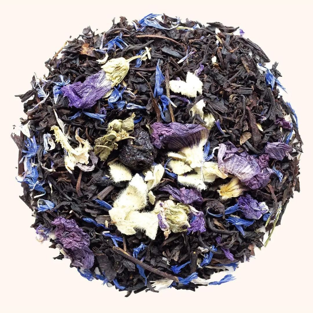 GIF pouring tea in an iridescent glass mug