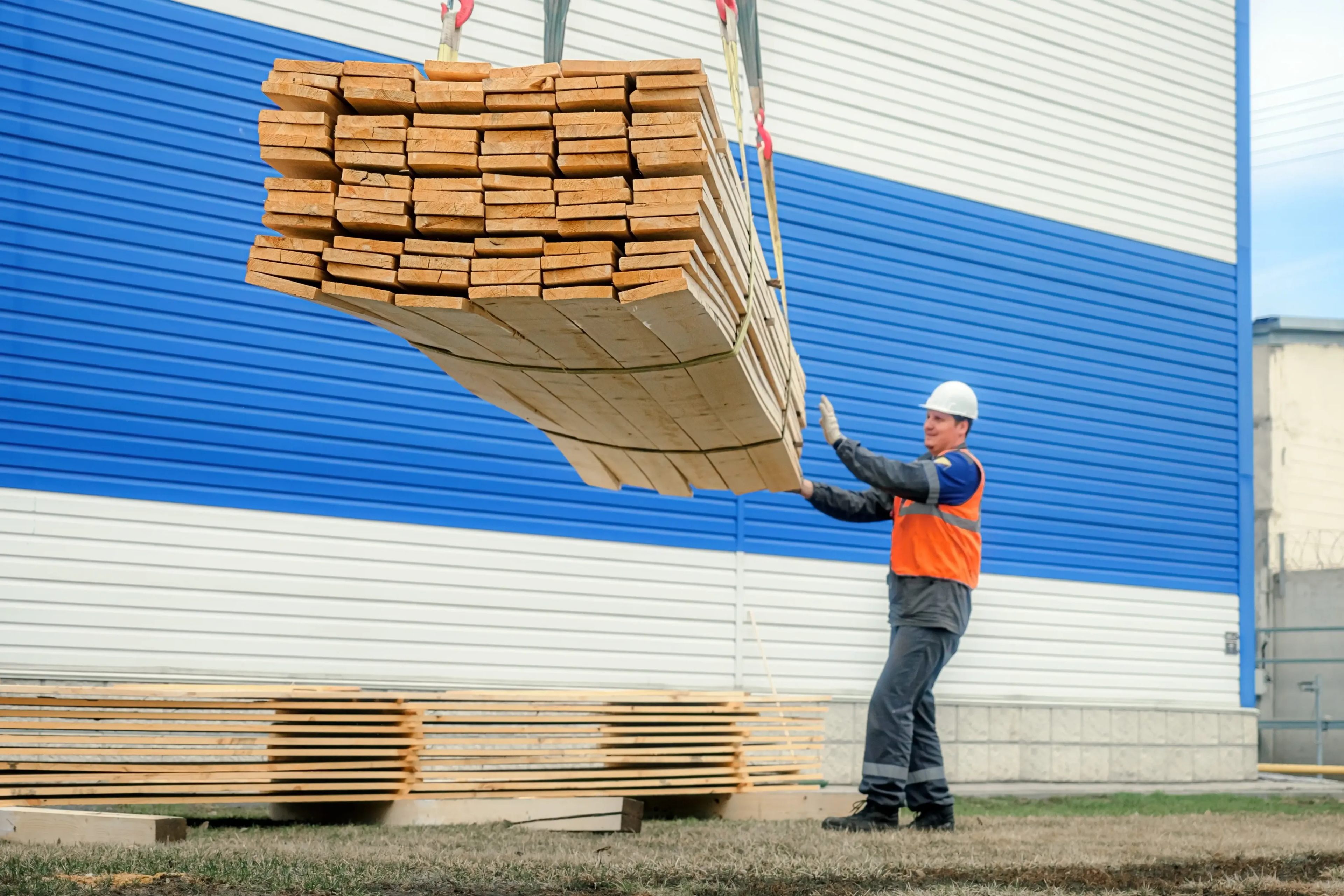 Worker at a lumber building materials supply store