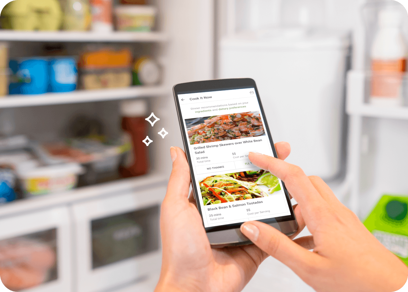 Photo showing a user scrolling delicious recipes on the Foodsmart mobile app with their fridge open