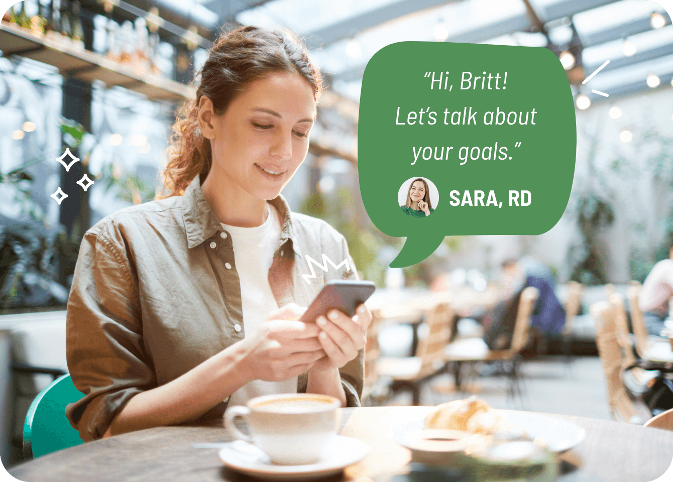 Photo of a relaxed woman texting her registered dietitian while at a café