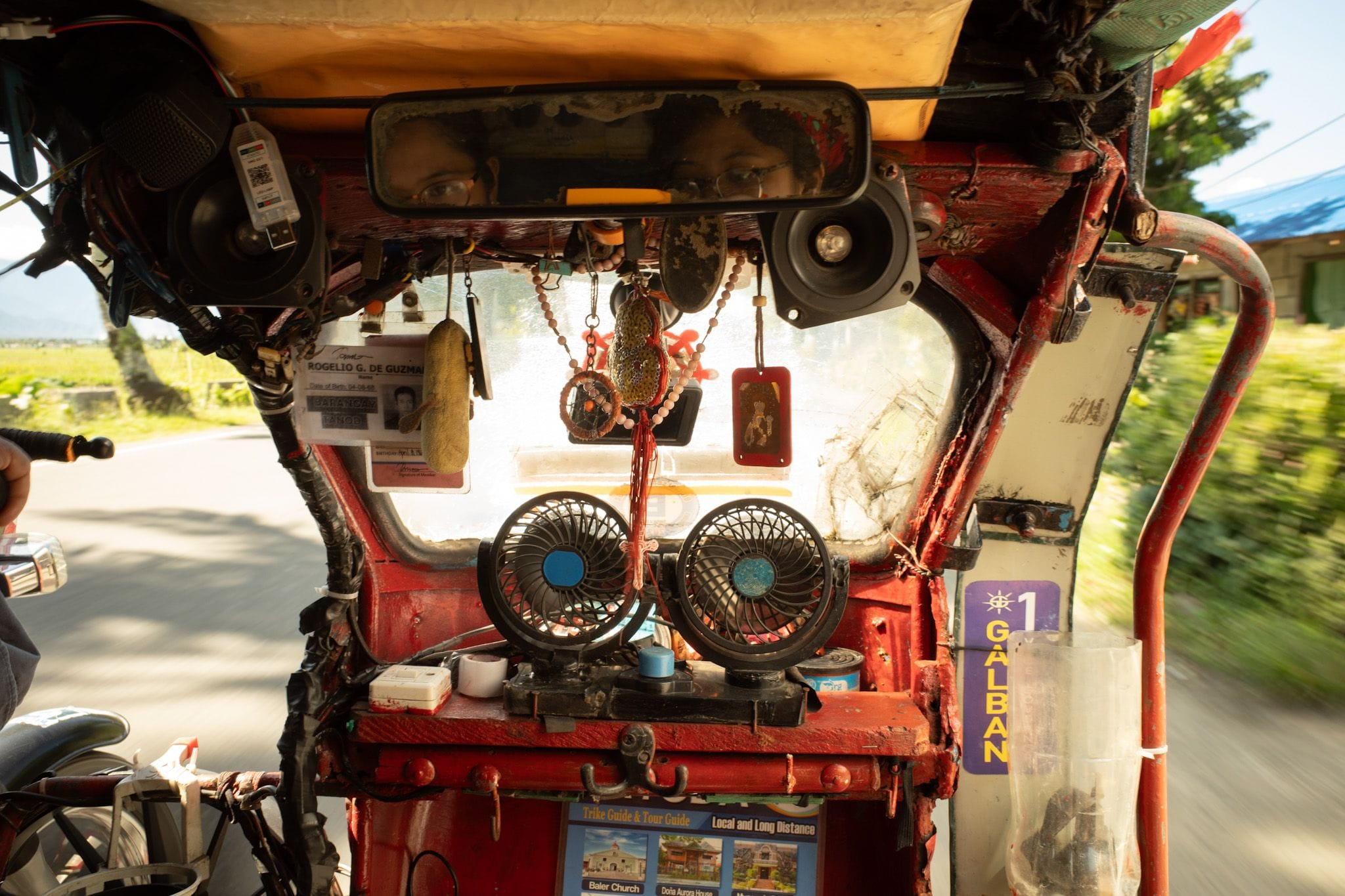 View of the inside of a tricycle, a common mode of public transportation in the Philippines.
