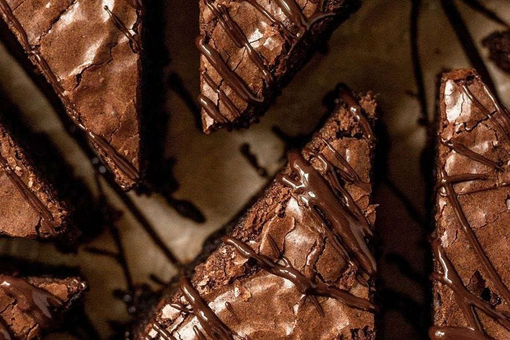 8 Holiday Recipes With a Cozy Tea Twist picture of decadent brownies - Teas the season to eat, drink and be merry! Read more.