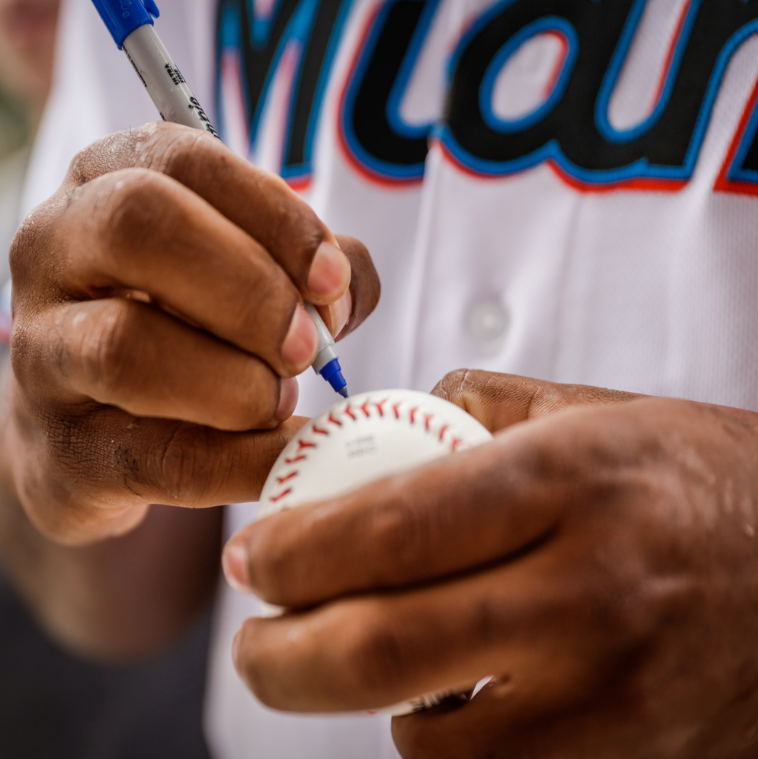 Autographed Marlins baseball