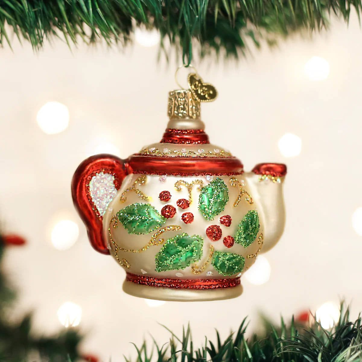 Scene of person opening Sips by's Hanukkah DIY tea advent calendar with a cup of tea on the floor