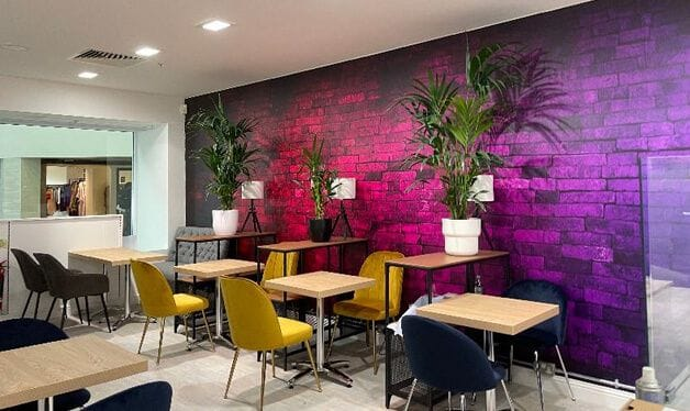 purple brick wall mural in a restaurant in scotland