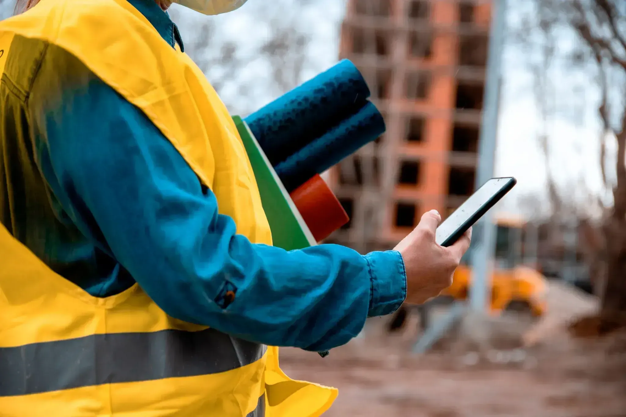 Construction worker on phone