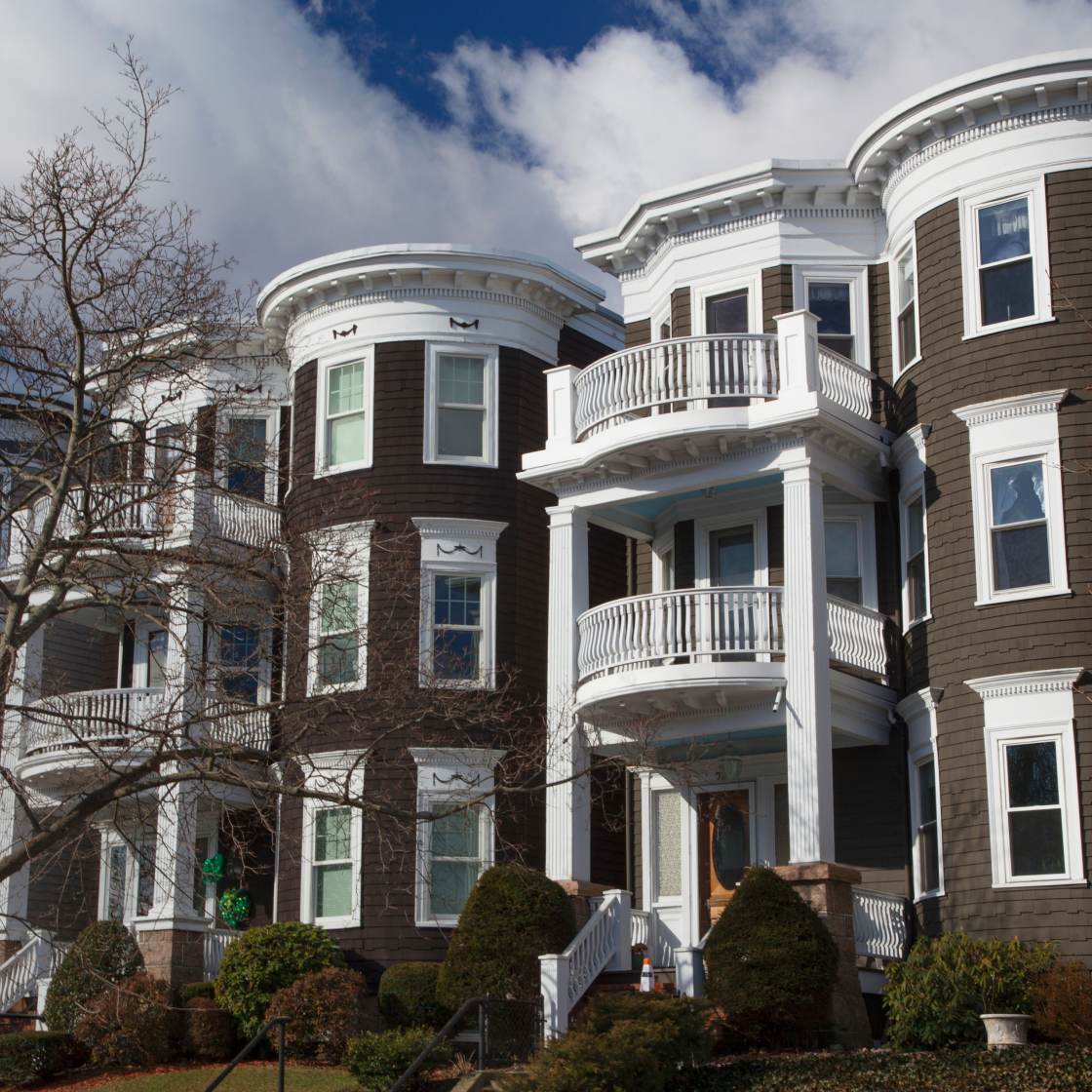 Boston condos with grey facade and white trim