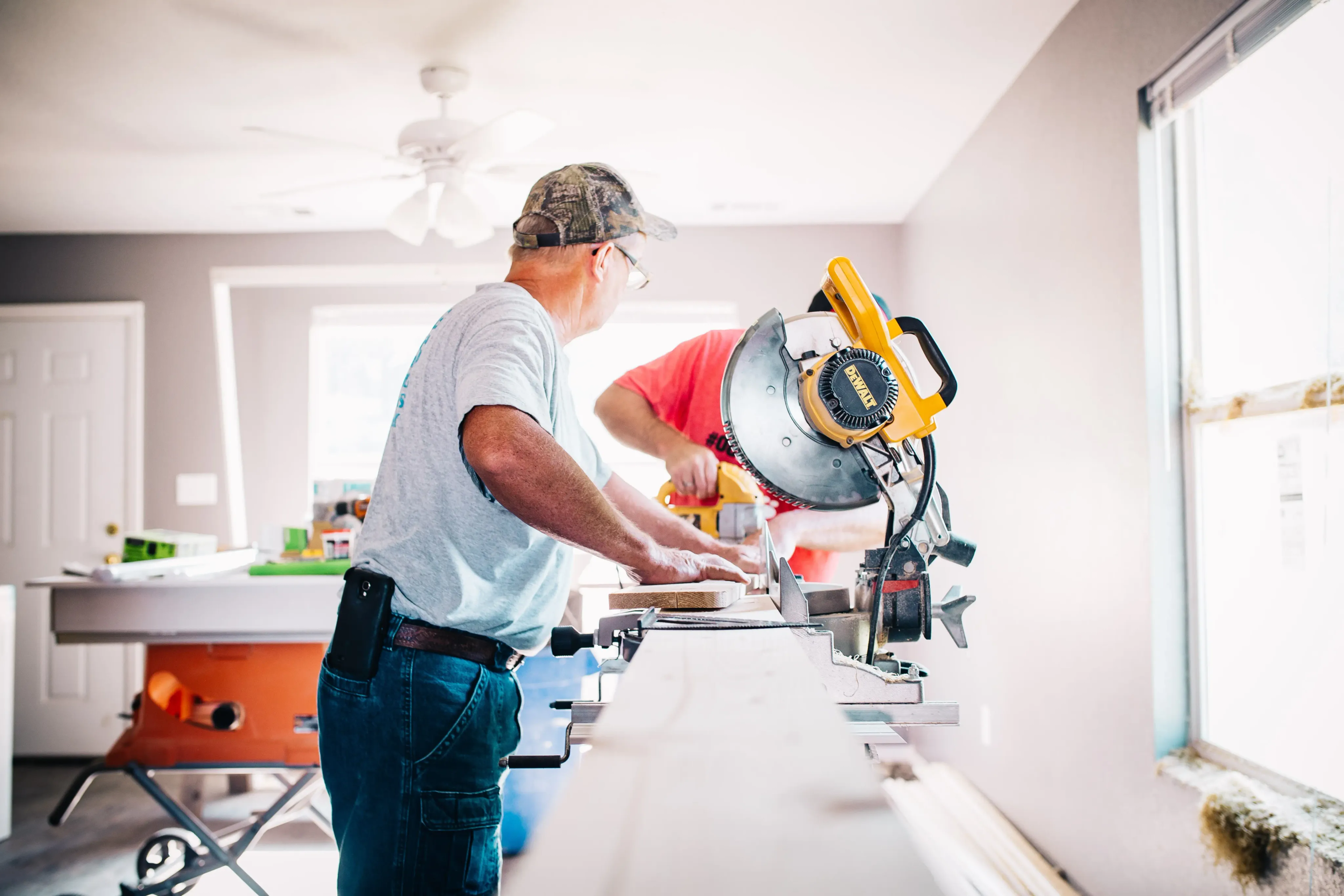 Contractor cutting wood