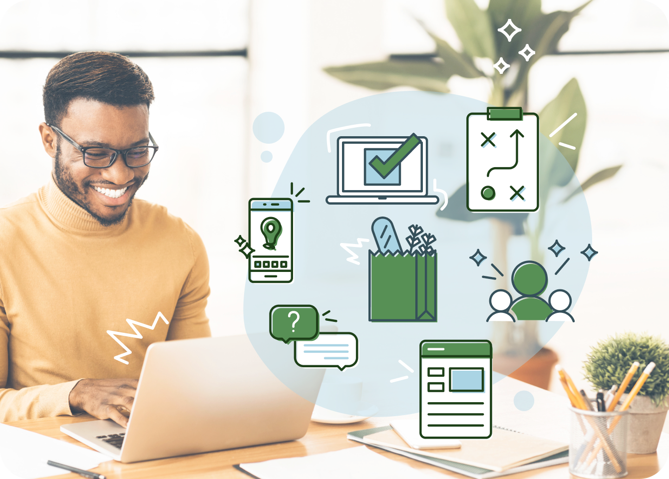 Photo of a happy man using a computer with iconography depicting shopping and nutrition goals being accomplished collaboratively