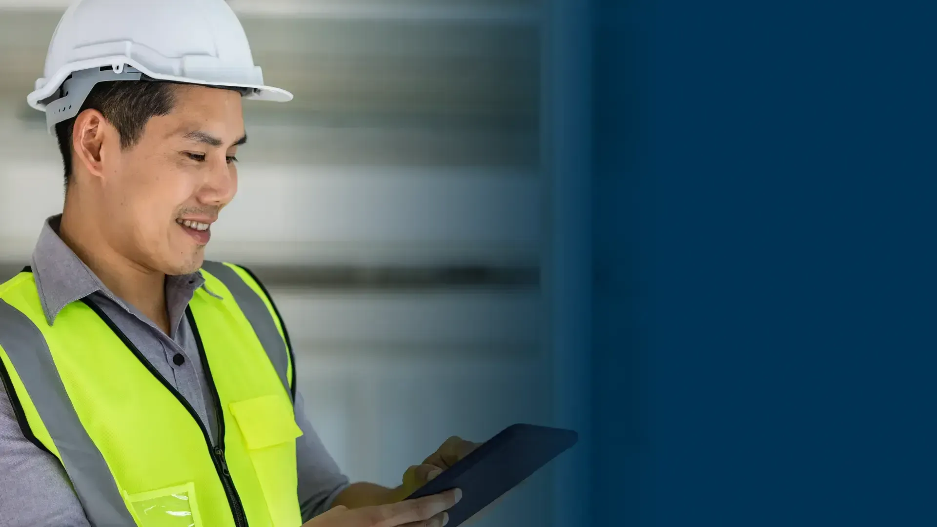 Construction worker using tablet