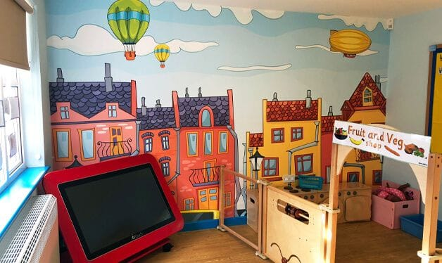 colourful city wall mural for a west town lane academy classroom