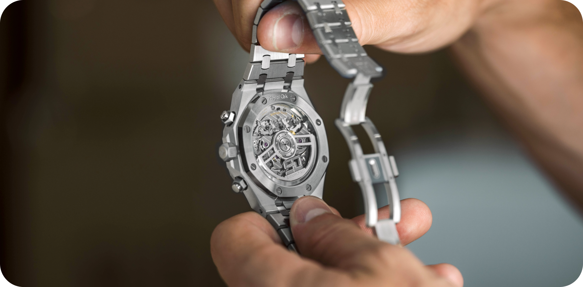 an image of a square Cartier watch on a man's wrist