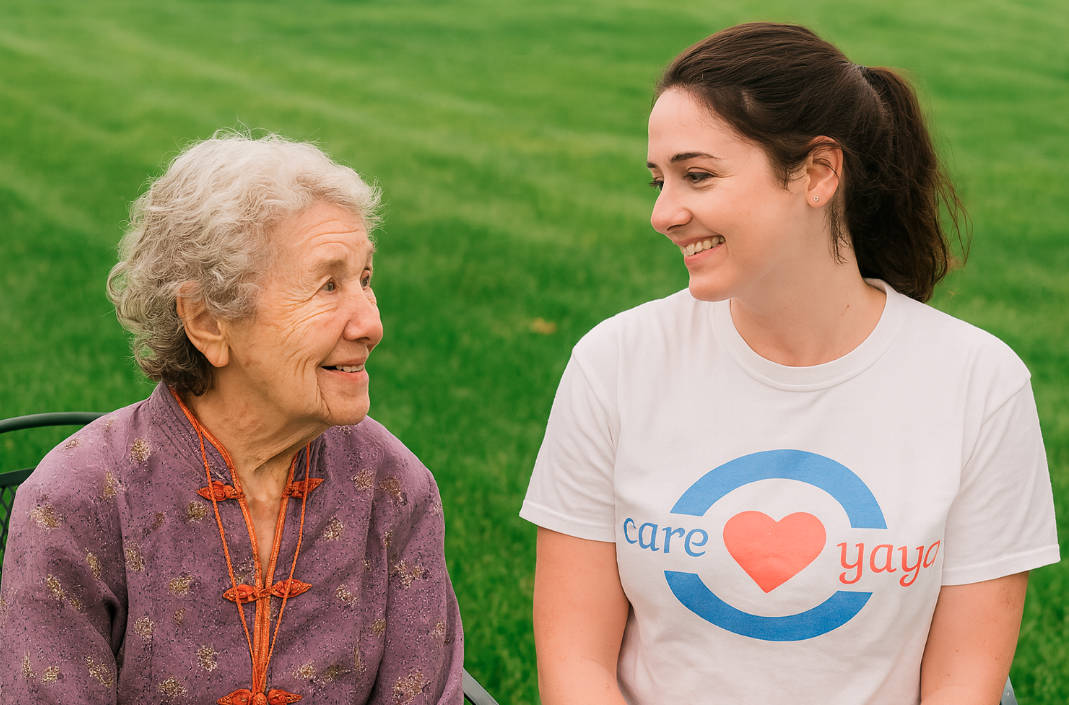 CareYaya student caregiver and care recipient smile at each other 