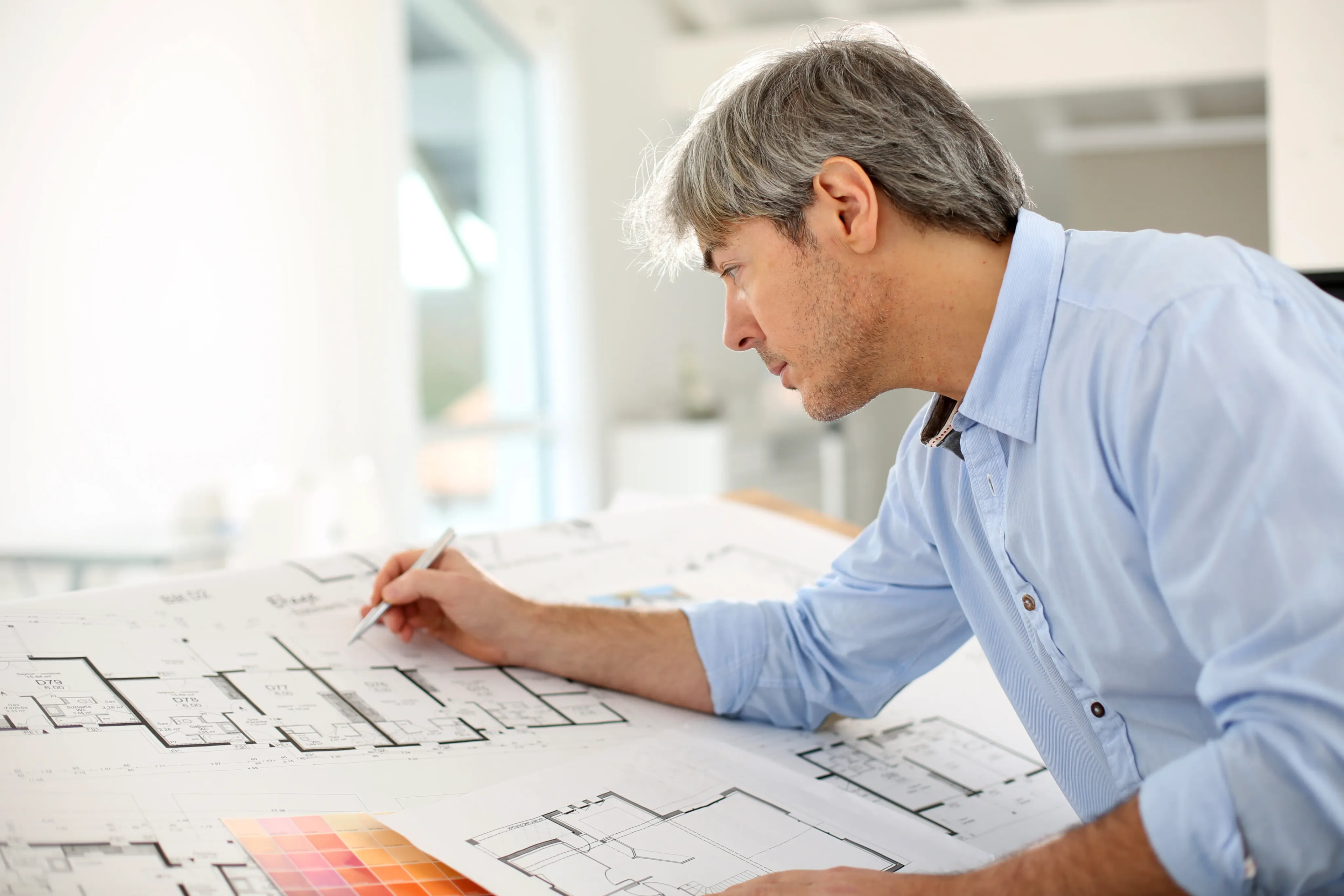 Architect working on floorplan