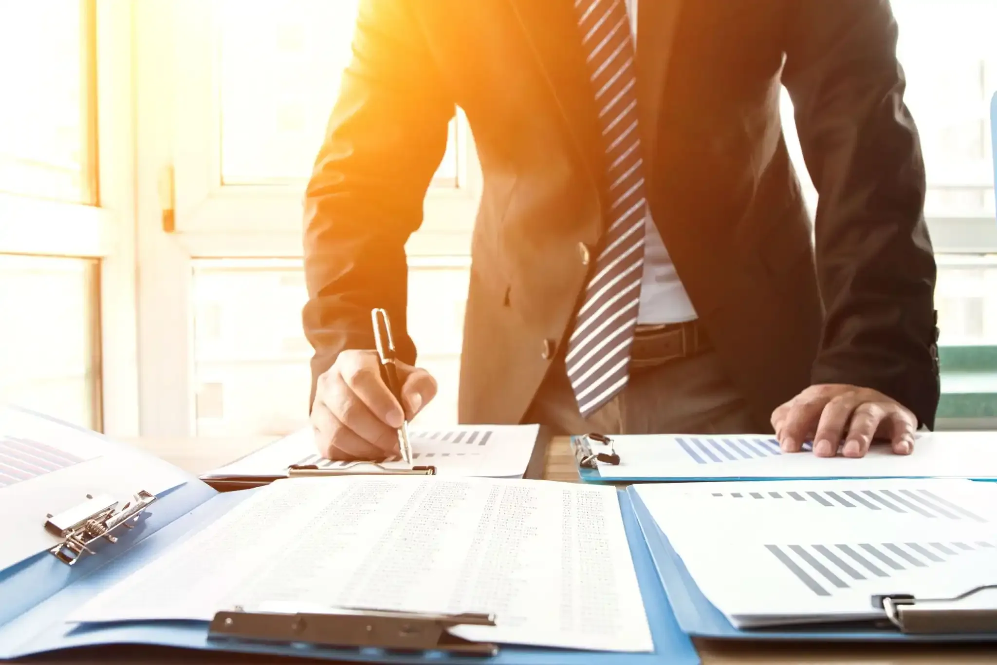 Man signing document