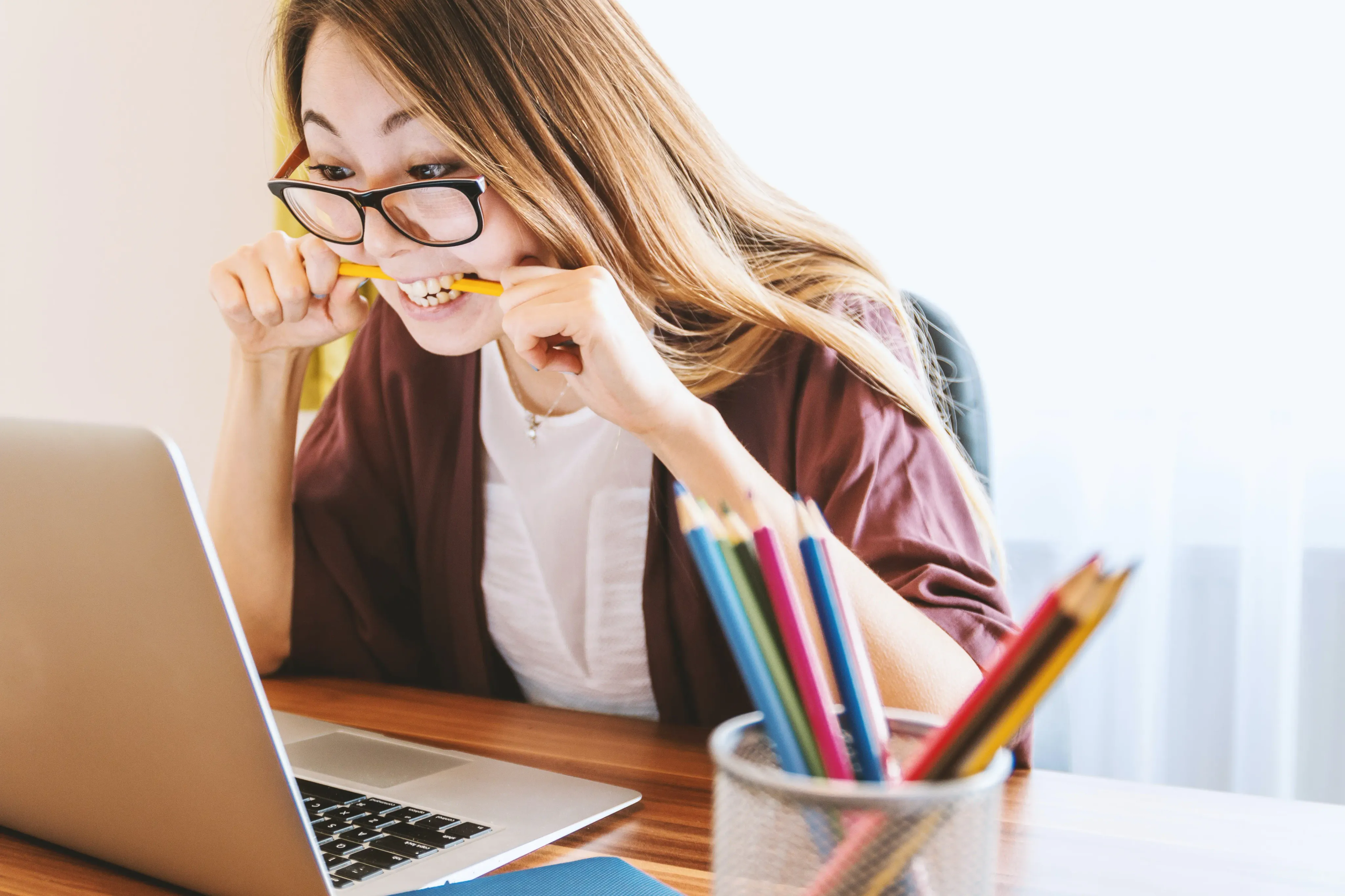 Frustrated woman at laptop