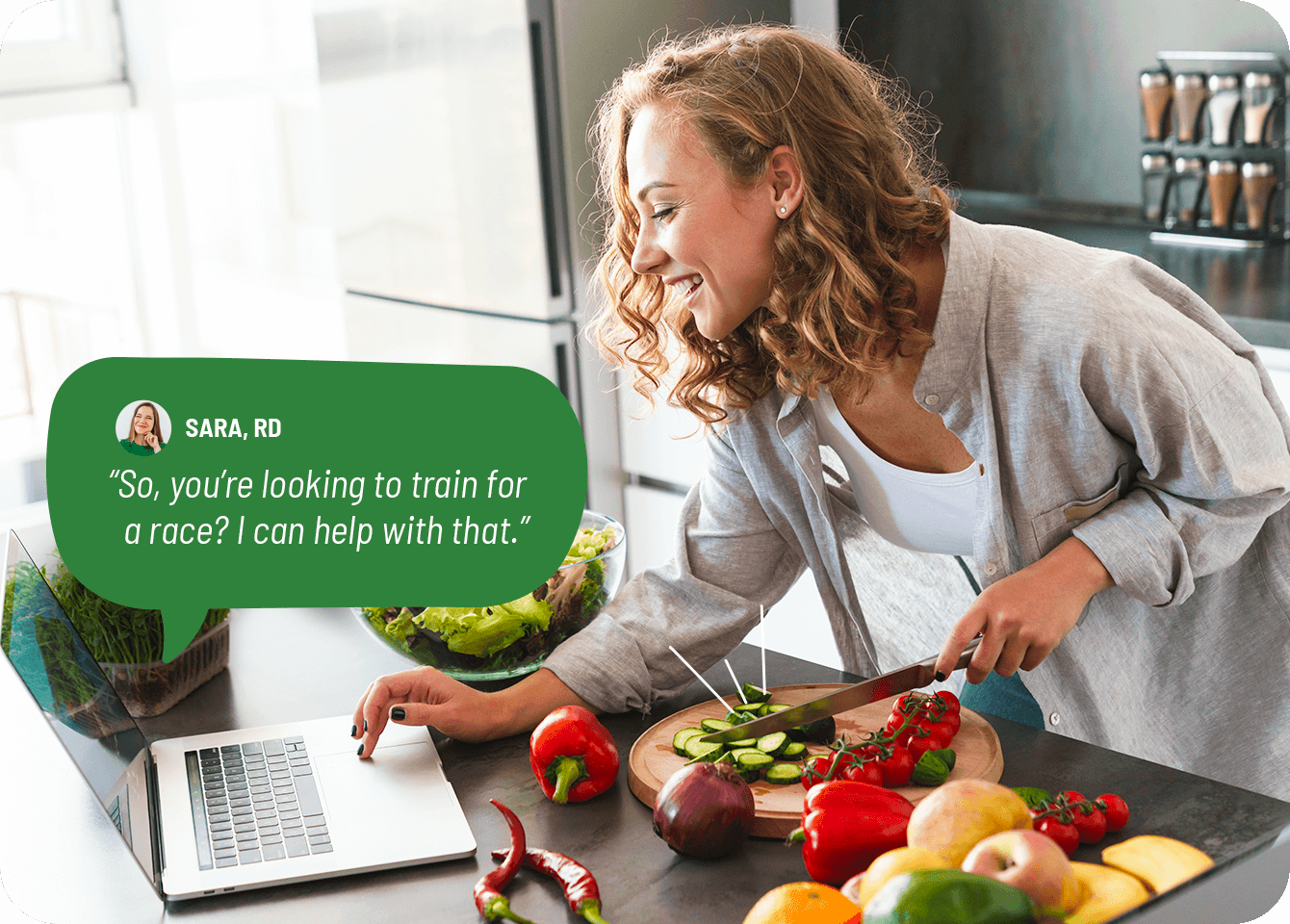 Photo of a happy woman consulting a dietitian while preparing a healthy meal