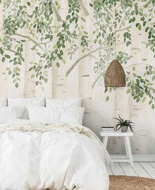 beige forest wallpaper mural in a stylish minimalist master bedroom