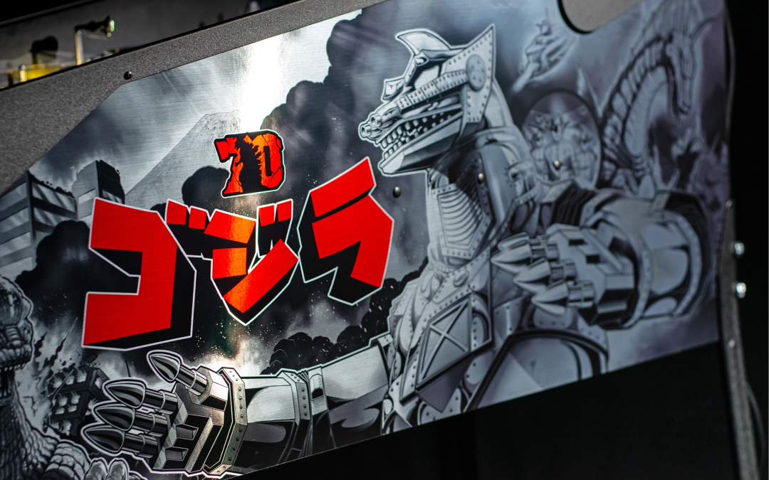 Black and white cabinet decals on Godzilla Anniversary Edition
