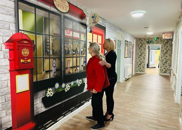post office facade wallpaper mural in an ashberry care homes corridor