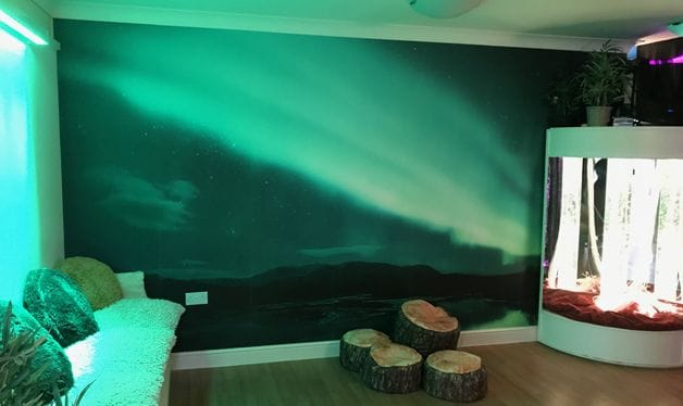 northern lights wall mural in a hawkhinge house care home communal area