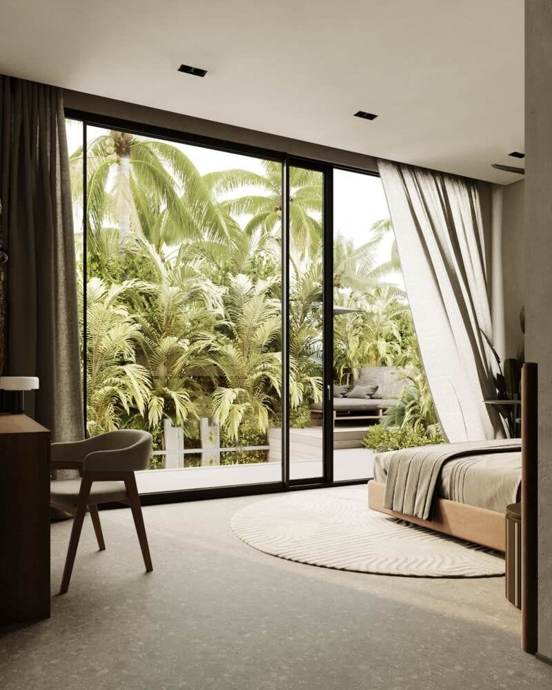 Guestroom overlooking the swimming pool area with lush green all around in LIOM, Bali