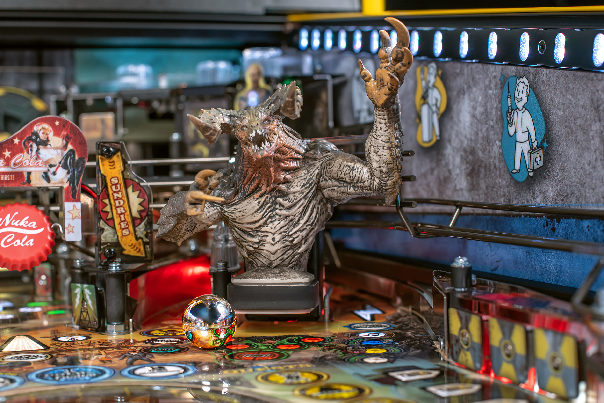 An interactive Deathclaw 3d model on the playfield of the Limited Edition Model of Fallout from Stern Pinball.