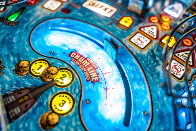 Shark fin in Chum Line on Jaws pinball machine.